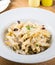 Prepared penne pasta with chicken and forest mushroom sauce, cheese with parmesan and mozzarella