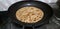Preparing Aloo paratha frying with ghee very popular in North India