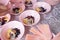 Preparing bowls of ice kacang or bean ice which is placed on a table. It is a popular dessert in Malaysia and Singapore