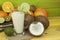 Preparing coconut refreshing drink. Tropical drink. The table at the beach bar. Tropical fruit for making alco