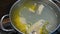 preparing delicious chicken broth in a silver pan in a home kitchen