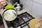 Preparing delicious pancakes on a home kitchen. Delicious delicacies served for dinner at home