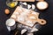 Preparing dumplings on a dark table