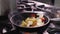 Preparing fried vegetables, tossing the pan - close up