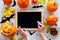 Preparing for halloween. Pumpkin head near pumpkins and black desk for notes on grey background top view mockup