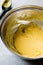 Preparing Hollandaise Sauce in Pot / French Cooking Recipe