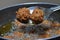 Preparing homemade CHINESE fried DRY MANCHURIAN BALLS in vessel