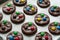Preparing homemade chocolate cookies decorated with colored candy drops