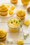 Preparing lemon cupcakes with citrus curd