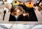 Preparing meal in pots on hot cooktop in kitchen