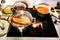 Preparing meals in pots on hot cooktop in kitchen