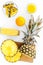 Preparing pineapple juice. Cut slices of pineapple. White background top view