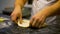 Preparing pizza dough on the restaurant kitchen table