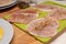 Preparing a pork chop in a home kitchen. Ingredients for a tasty