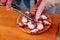 Preparing a portion of pulpo a feira, typical octopus recipe in Galicia, Spain