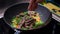 Preparing recipe sesame beef wok, minced summer vegetables