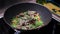 Preparing recipe sesame beef wok, minced summer vegetables