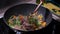 Preparing recipe sesame beef wok, minced summer vegetables