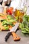 Preparing spinach leaves on cutting board