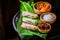 Preparing spring rolls with sweet and sour sauce
