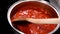 Preparing tomato sauce for pasta