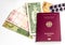 Preparing for a trip around the world with a passport, banknotes