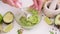 Preparing vegetarian avocado sauce - Mashing avocado in bowl with a spoon