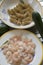 Preparing wholemeal pasta with shrimps and zucchini