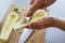 Preparing zuchini hands on the kitchen table