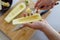 Preparing zuchini hands on the kitchen table