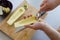 Preparing zuchini hands on the kitchen table