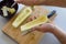 Preparing zuchini hands on the kitchen table