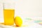 Prepearing for Easter. Coloring painting eggs in glasses with Yellow color. copyspace