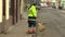 PREROV, CZECH REPUBLIC, NOVEMBER 17, 2017: The woman sweeps and cleanses the sidewalk of the city, very dirty, ugly and