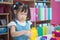 Preschool age girl playing plastic blocks