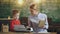 Preschool child. Mother and son typing on typewriter. Schoolboy sitting in class.