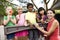 Preschool children on playground with teacher