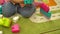 Preschool happy toddler playing with multi coloured building blocks in kindergarten. Education in nursery school