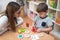 Preschool Teacher with Kid Having Creative Educational Activities