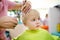 Preschooler boy getting haircut