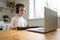 Preschooler boy in headphones learns to play the musical keyboard online. Distance learning to play the piano. Online music