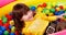 Preschooler girl with ball in play room.