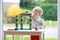 Preschooler girl building from plastic bricks