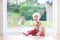 Preschooler girl playing with puzzles on the floor