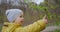 Preschoolers Exploring the Woods. Baby boy happy to walking. Little Baby Boy In Nature. 2-year-old boy in a yellow