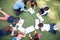 Preschoolers taking a class outdoors