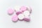 Prescription drugs, Pink and white pills of different colors all mixed in each tablet.