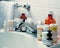 Prescription medicine bottles on bathroom sink overloaded with prescription medicines