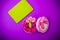 Present box with flowers macaroons and tablet violet background with love