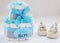 Present cake with diapers for newborn baby boy